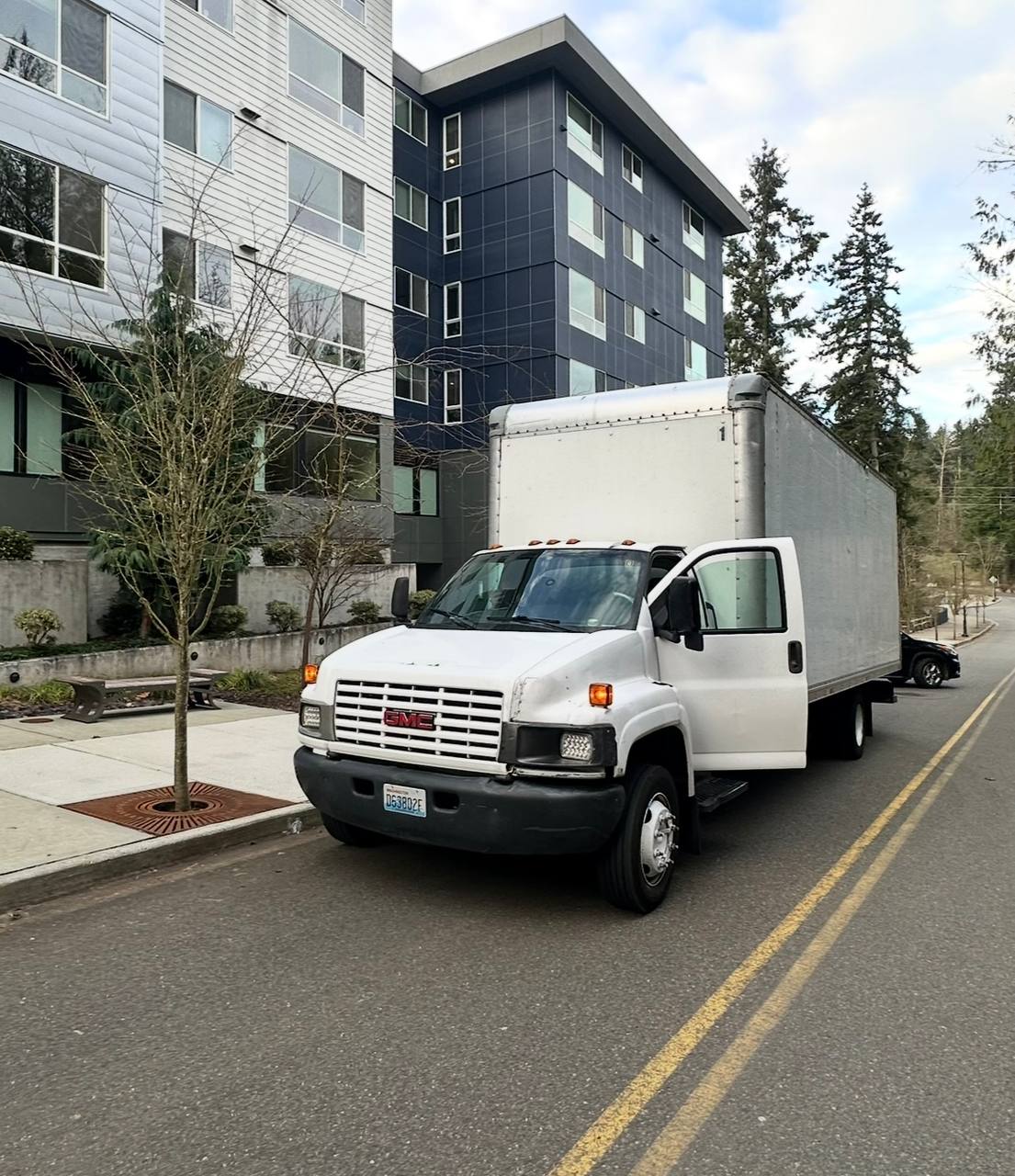 M-Trucks moving truck outside Seattle apartment building
