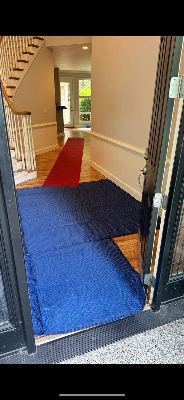 Floor protection with carpet runner and blankets